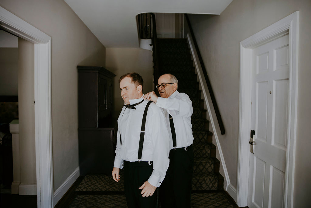 Normandy Farm gate house groom getting ready wedding photographer Blue Bell Pennsylvania